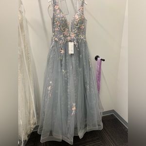 New only modeled. Size 14 with lace, embroidery and sparkles. Purchased at $498.